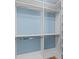 Walk-in closet with shelving and rod space is ready for organizing clothing at 1032 N Ocean Blvd., Surfside Beach, SC 29575