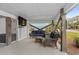 This covered patio features comfortable seating at 1032 N Ocean Blvd., Surfside Beach, SC 29575