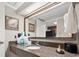 Bathroom featuring a wide mirror and granite countertop at 1105 S Ocean Blvd. # 1134, Myrtle Beach, SC 29577