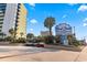 Exterior shot of Coral Beach sign, promoting great amenities like bowling, restaurants, bars, and pools at 1105 S Ocean Blvd. # 1134, Myrtle Beach, SC 29577