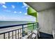 Balcony overlooking the ocean with white chairs and a blue railing and an open, airy ambiance for relaxation at 1105 S Ocean Blvd. # 732, Myrtle Beach, SC 29577
