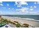 Beach view with beach chairs and umbrellas and a beautiful ocean view from an upper story of the resort at 1105 S Ocean Blvd. # 732, Myrtle Beach, SC 29577