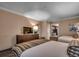 Cozy bedroom with two beds, a dresser with a television and a doorway leading to a second room at 1105 S Ocean Blvd. # 732, Myrtle Beach, SC 29577