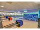 Modern bowling alley includes multiple lanes with overhead monitors, perfect for recreational activities at 1105 S Ocean Blvd. # 732, Myrtle Beach, SC 29577