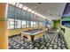Game room with pool tables, bar stools, and large windows, offering a relaxed recreational environment at 1105 S Ocean Blvd. # 732, Myrtle Beach, SC 29577