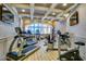Well-equipped gym features treadmills, exercise bikes, weight machines, and a mirrored wall for complete fitness at 1105 S Ocean Blvd. # 732, Myrtle Beach, SC 29577