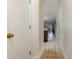 Hallway leads into the home with tile flooring and neutral paint, offering a seamless transition to living spaces at 1250 River Oaks Dr. # 16B, Myrtle Beach, SC 29579