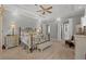 Serene main bedroom with tray ceiling, walk-in closet access, and soft neutral tones at 1428 Whooping Crane Dr., Conway, SC 29526