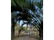 Scenic view of a pond and surrounding landscaping from behind a fence at 144 Harbor Lights Dr., Surfside Beach, SC 29575