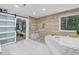 Modern bathroom featuring a soaking tub, walk-in shower, and sleek finishes at 145 Bendick Ct., Little River, SC 29566