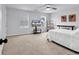 Bright bedroom with carpet, ceiling fan, and a TV, creating a relaxing space to enjoy at 145 Bendick Ct., Little River, SC 29566