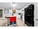 Bright kitchen features white cabinets, center island, and modern stainless steel appliances at 145 Bendick Ct., Little River, SC 29566