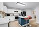 Bright kitchen featuring an island, seating, stainless steel appliances, and ample counter space at 145 Bendick Ct., Little River, SC 29566