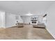 Spacious living room featuring modern design with plank floors and a modern fireplace and media center at 145 Bendick Ct., Little River, SC 29566