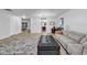 Spacious living room features an open floor plan with hardwood floors and neutral decor at 145 Bendick Ct., Little River, SC 29566