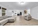 Spacious open concept living room with plank flooring with combined kitchen and living area at 145 Bendick Ct., Little River, SC 29566
