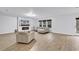 Bright and airy living room featuring a modern fireplace with combined kitchen and living area at 145 Bendick Ct., Little River, SC 29566
