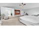 Serene main bedroom with ensuite bath, ceiling fan, and open doorway at 145 Bendick Ct., Little River, SC 29566