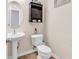 This powder room features a pedestal sink, toilet, and a built-in medicine cabinet at 145 Bendick Ct., Little River, SC 29566
