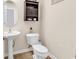 This powder room features a pedestal sink, toilet, and a built-in medicine cabinet at 145 Bendick Ct., Little River, SC 29566