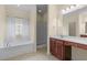 Bright bathroom featuring tile floors, a soaking tub, and separate shower at 158 Shady Arbor Loop, Longs, SC 29568