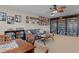 Living room featuring a sofa, built-in bookshelves and a chess table at 1685 Sapphire Dr., Longs, SC 29568