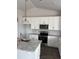 Well-equipped kitchen with white cabinets, granite countertops, and stainless steel appliances at 174 Glengrove Lane, Murrells Inlet, SC 29576