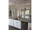 Bright, open kitchen featuring granite countertops, white cabinetry, stainless steel appliances, and pendant lighting at 175 Glengrove Lane, Murrells Inlet, SC 29576