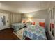 Bright bedroom featuring two beds, soft lighting and a clean design at 201 N 74Th Ave. N # 2322, Myrtle Beach, SC 29572