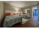 Bright bedroom featuring two beds, mirrored wall and access to a private balcony at 201 N 74Th Ave. N # 2322, Myrtle Beach, SC 29572
