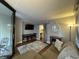 Inviting living area featuring a TV, bar seating, cozy seating, and access to an outdoor patio at 201 N 74Th Ave. N # 2322, Myrtle Beach, SC 29572
