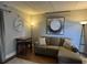 Comfortable living room with a cozy sectional sofa, modern art, and warm lighting, perfect for relaxation at 201 N 74Th Ave. N # 2322, Myrtle Beach, SC 29572