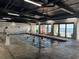Indoor pool area with ocean views, lounge chairs, and direct access to balcony at 201 N 74Th Ave. N # 2322, Myrtle Beach, SC 29572