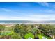 Stunning aerial view of manicured lawns, a sandy beach, and the beautiful Atlantic Ocean at 2106 N Ocean Blvd. # 410, Myrtle Beach, SC 29572