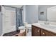 Cozy bathroom with a combination tub and shower and vanity with storage at 220 Forestbrook Cove Circle, Myrtle Beach, SC 29588