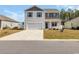 Charming two-story home with a two-car garage and manicured lawn, offering curb appeal at 220 Forestbrook Cove Circle, Myrtle Beach, SC 29588