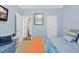 Bedroom with bed and an open door, adjacent to a closet and en-suite bathroom at 224 Cupola Dr., Longs, SC 29568