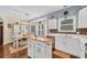 Bright, open kitchen design with stainless steel appliances and adjacent breakfast nook at 224 Cupola Dr., Longs, SC 29568