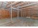 Spacious barn interior featuring exposed wooden beams and plank walls offering rustic charm and potential at 2360 Highway 701 North, Loris, SC 29569
