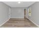 A bedroom has an interior door, closet, and window at 2360 Highway 701 North, Loris, SC 29569