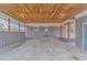Spacious carport featuring wood ceiling, brick facade, and ample parking at 2360 Highway 701 North, Loris, SC 29569