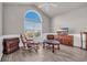 Cozy bonus room with a large arched window and comfortable seating at 2385 Windmill Way, Myrtle Beach, SC 29579