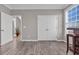 A spacious bonus room with tiled floors and natural light at 2385 Windmill Way, Myrtle Beach, SC 29579
