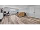 Bright bonus room with a large window, comfortable sofa, and a gaming setup at 2385 Windmill Way, Myrtle Beach, SC 29579