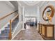 Elegant foyer with decorative columns and staircase at 2385 Windmill Way, Myrtle Beach, SC 29579