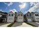 Exterior of new construction townhomes with driveways and modern siding at 265 Christiana Ln. # E, Myrtle Beach, SC 29579