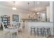 Bright kitchen with breakfast bar adjacent to the dining area at 265 Venice Way # 1-201, Myrtle Beach, SC 29577