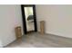 Cozy bedroom with a large mirror and hardwood floors at 3700 Golf Colony Dr. # 26G, Little River, SC 29566