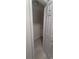 Bright closet with white shelving and light colored flooring and fresh white door and trim at 3700 Golf Colony Dr. # 26G, Little River, SC 29566