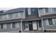 Charming two-story townhouse featuring a gray exterior with white trim and shutters on the windows at 3700 Golf Colony Dr. # 26G, Little River, SC 29566